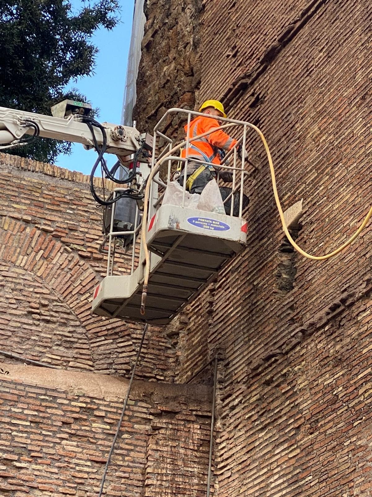 Works at height on brick façade